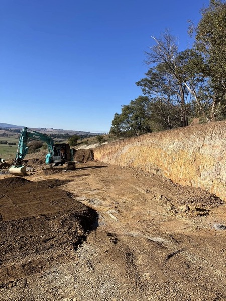 Earthworks and a cut batter on a rural Tasmanian block